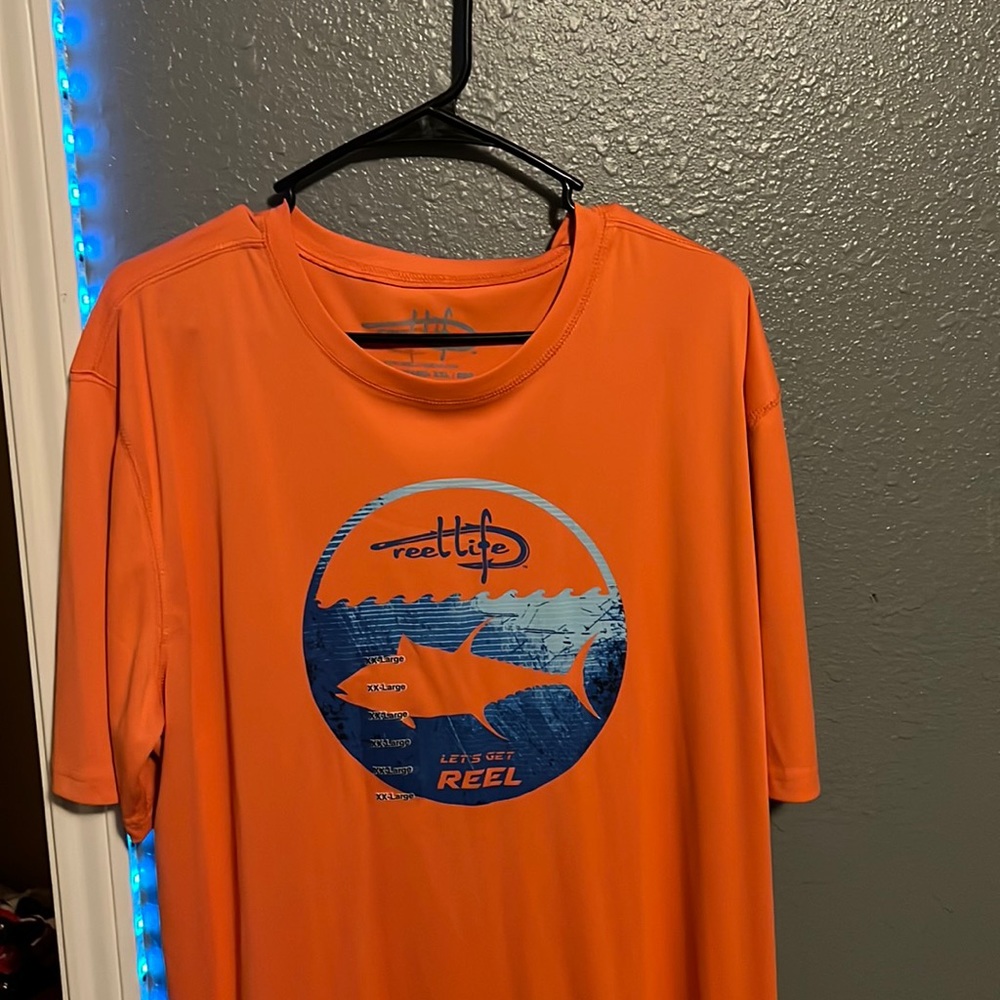 Reel life fishing shirt with Tags